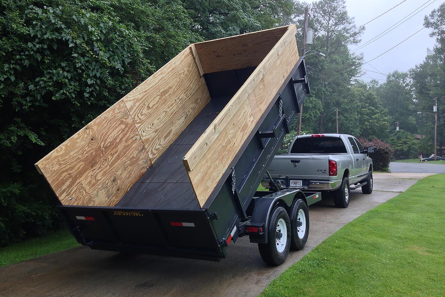 pickup truck with dump trailer attached